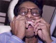 When rubber grips the ball , the denture remains firmly in place and it takes some force to remove it